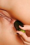Milf ponstar Sandy masturbating pussy and ass with a large cucumber