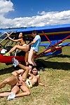 Two asian strumpets swallowing schlong and fucking by private airplane