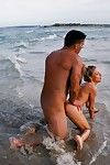 Blond pretty girl fucked in ass in the sea