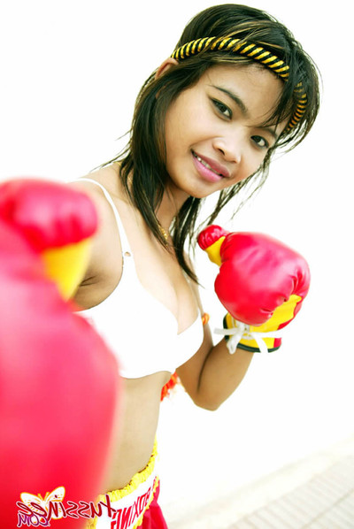 Bangkok young tussinee in a wild muay thai boxing outfit