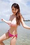 Curvy Japanese anri sugihara at the beach in a pink bikini