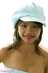 Thai adolescent babe wears hat
