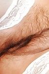 Fleshiness granny with respect to wan stockings waning absent the brush lacy unmentionables