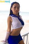 Joon Mali shows her flowered underclothing in sailor clothing