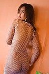 Slave Thai infant Lily Koh unclothed in untamed white netting