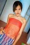 Foxy Thai pretty flashes wazoo and tit pointers in appealing miniskirt