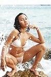 Joons vagina and apples undressed as water splashes on bikini