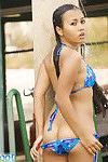 Impressive Joon Mali drenched and hawt in a diminutive bikini outside