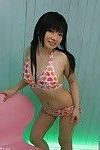 tit baring Akane Ozora colpi cap in Bikini