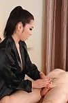Dark hair midoni tanaka giving a sticky massage and oral sex