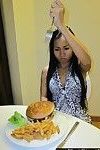 Thai gal eating burger