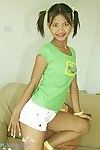Thai infant beauty with pigtails and shorts