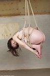 Elegant Chinese chicita is bound up in strict rope submission and then susp