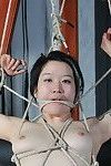 Sweet oriental adolescent in playroom rope slaving