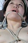 Sweet oriental adolescent in playroom rope slaving