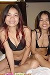 Stunning thai twins pose and enjoy for the web camera