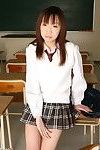 Infant japanese schoolgirl ai yumemi is posing