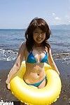 Japanese av idol saki koto playing on beach