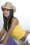 Miniscule thai floozy can hide her melons in a hat
