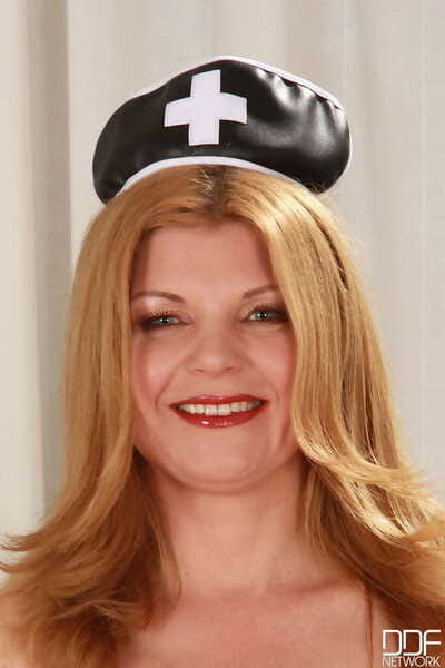 Thick full-grown lass Susi doffs will not hear of leather nurse outfit to plaything will not hear of hairy bush