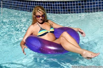 While in the pool horny milf Samantha Ryan plays with her slender body