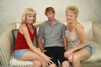 Two blonde grannies share a horny students hard white dick on the sofa