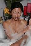 Ducky Asian milf Tia Ling gets soaked at the sight of big dong