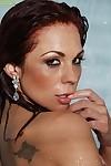 Wonderful red-haired babe Kirsten Price takes shower and rubs melons