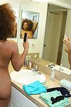 Busty ebony mom Kat soaps up her saggy black tits in the shower