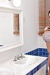 Dangerously hot milf Sensual Jane shows off her giant tits in the bath