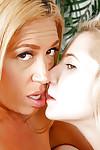Blonde lesbians Stevie Lix and Odette Delacroix tongue kissing and tribbing