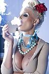 Steamy blonde MILF Puma Swede smoking and revealing her goods