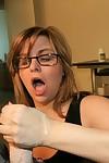 Slutty MILF in glasses gives a handjob and gets rewarded with a large cumshot
