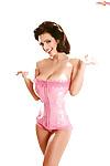 Chesty Italian pinup model Denise Milani modeling non nude in corset