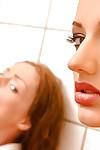 Redheads Aylin Diamond and Sophie Lynx engage in BDSM sex in bathroom