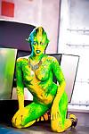 Kinky cosplay chick Tiffany Doll posing in body paint uniform and spreading