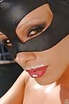 Stupendous pornstar in catwoman outfit performs a milky strip scene