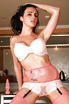 While wearing slutty lingerie Latina MILF Lexi Ward poses like a bimbo