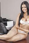 Titty secretary Diamond Kitty is posing naked on the working table