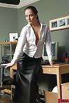Amateur MILF Sammy looking sexy in long leather skirt in office