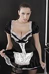 Busty Euro maid Sensual Jane posing in black nylons and high heels