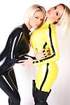 Non nude posing scene featuring Dannii Harwood and Lucy Zara in latex