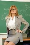 Redheaded teacher in glasses Darla Crane showing off bare MILF curves
