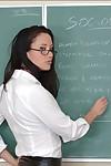 Alluring teacher in glasses Kimberly Kole bent over her desk and fucked