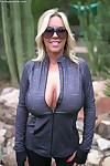 Chesty mature woman Sandra Otterson letting massive natural tits loose