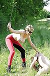 Gorgeous matur femdom in sunglasses whipping her manslave outdoor