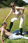 Lusty femdom in sunglasses spends some good time with her male pet outdoor