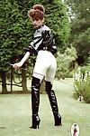 Tempting fetish lady posing in sexy horse jokey outfit outdoor