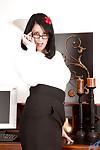 Big titted mature in glasses and stockings posing shamelessly