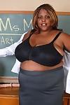 Mature ebony teacher SSBBW Winxx is undressing in the classroom